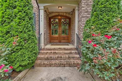 Beautiful double door entry leads to your new home