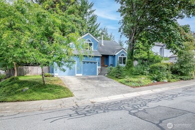 Welcome Home to this corner lot oasis!
