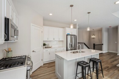 Kitchen -  photo is of a previous inventory home. Inquire for more details and options.