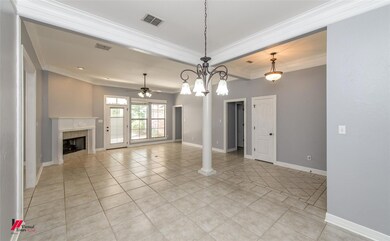 Large formal dining area overlooking the living ar