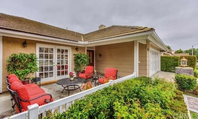Front patio entrance makes a visit to this home wa