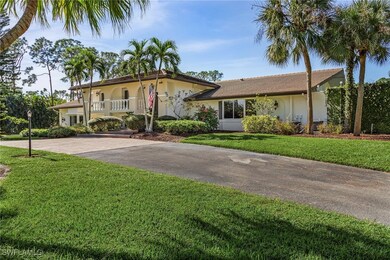 View of front of property with a front yard