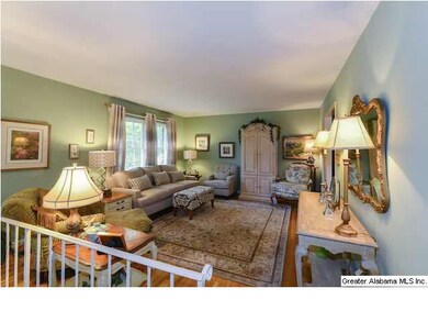 Good sized living room with hardwoods