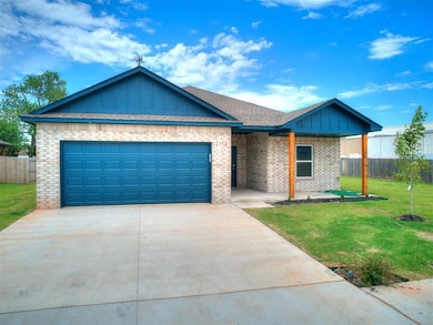 View of front facade featuring brick siding, concrete driveway, an attached garage, board and batten siding, and a shingled roof