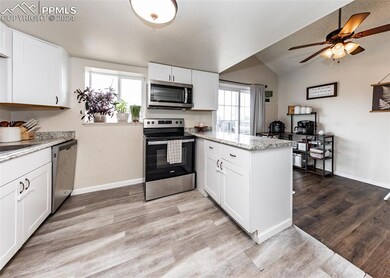 Kitchen featuring appliances with stainless steel 