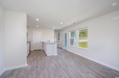 Kitchen featuring light wood-type flooring, a kitc