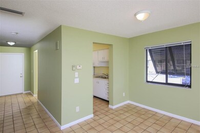 View from living room to entry and kitchen.  Easy 