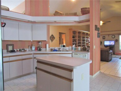 Smartly Designed Kitchen w/ Open Serving Bar To Fa