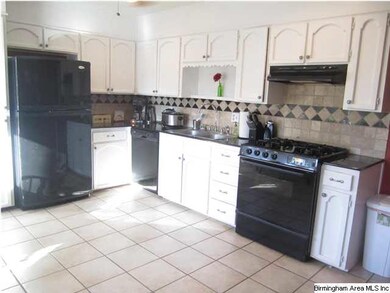 Granite counter tops, gas cook top, decorative bac