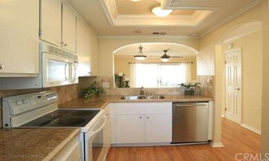 Updated Kitchen with Granite Counters and Traverti