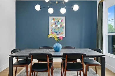 Dining space featuring baseboards and wood finish