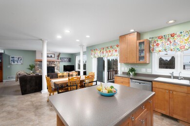 flows from kitchen, to dining to living room