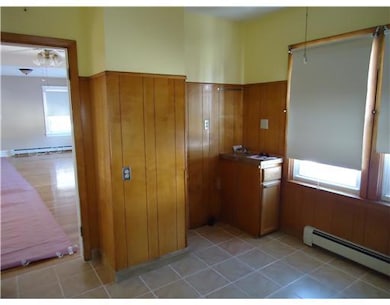 Kitchen. OTHER SIDE OF KITCHEN, SHOWING DOORWAY TO