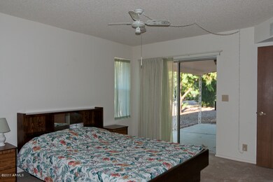 Master bedroom, slider to patio.