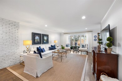 Relax and unwind in the spacious living room, wher