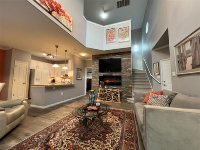 Living area featuring wood finished floors, baseb