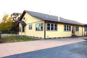 side of home and driveway