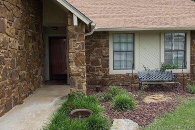 Nice little covered porch area and garden area in