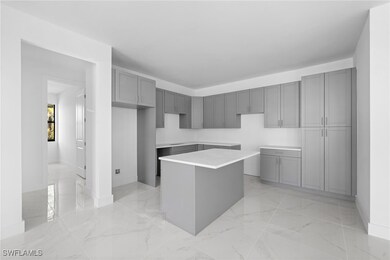 Kitchen with gray cabinets and a kitchen island