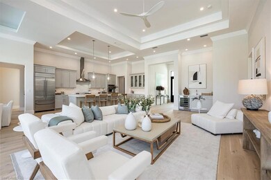 The open concept main living area features white o