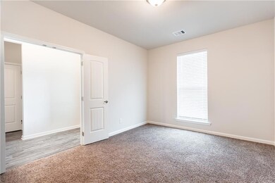 large office/playroom/bonus room to the left of th