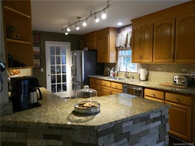 Kitchen has granite countertops