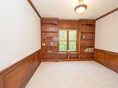 Adjacent to the Family Room find the Den/Office fe