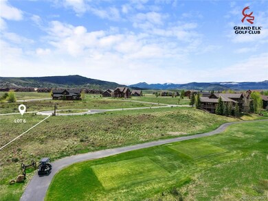 Stunning perspective of Lot 6 overlooking the fairways and open landscapes of the Craig Stadler-designed 18-hole course. Lot lines shown are approximate.