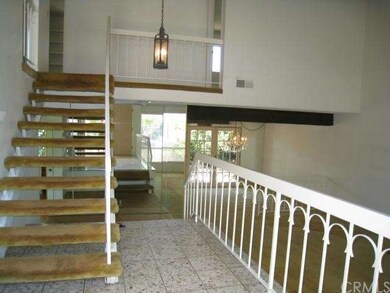 STAIRWAY LEADS TO LIVING AREA & BEDROOMS