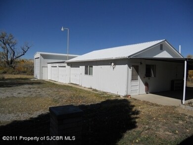 detached 4 car shop/garage