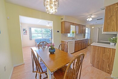 Open dining room and kitchen concept.