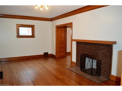 Living room leading into dining room with built ins