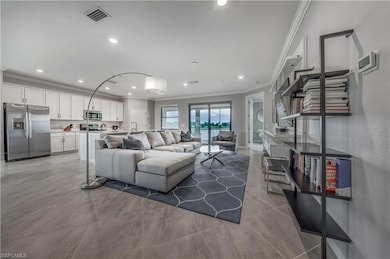 Living room featuring ornamental molding