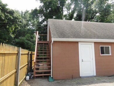 Stairs Leading To Loft Above Garage