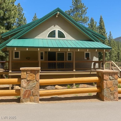 View of front of home featuring a porch, a standin