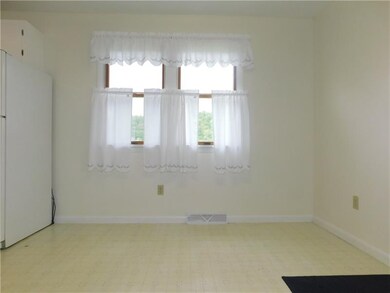 The eat in area of the kitchen has 2 windows...all
