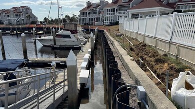 View of dock featuring a residential view and a wa