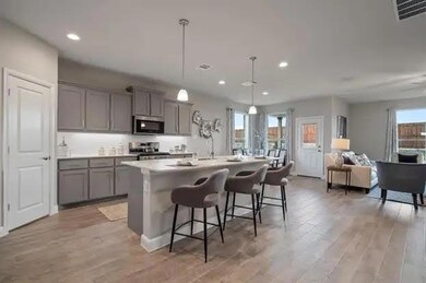 Photos shown here may not depict the specified home & features included are for illustration purposes only