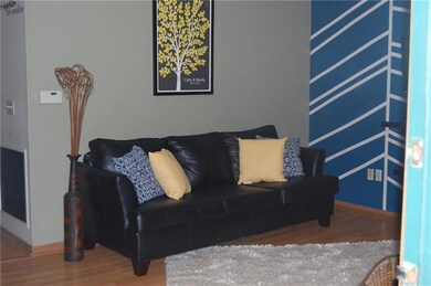 Nice living room with laminate flooring throughout
