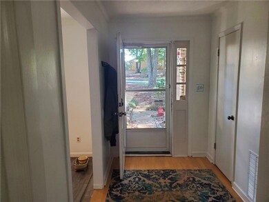Doorway to outside with light wood-type flooring, 