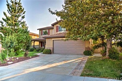 Wonderfully landscaped home with mature trees.