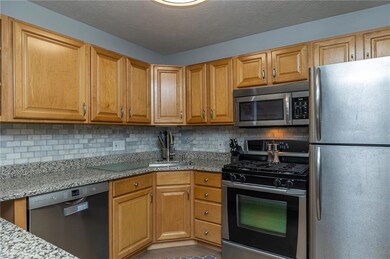 Granite countertops and stainless steel appliances