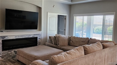 Living room with hardwood / wood-style floors and