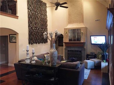Living Room. High vaulted ceilings with concrete stained floors.