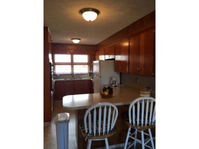 Eat in kitchen with appliances