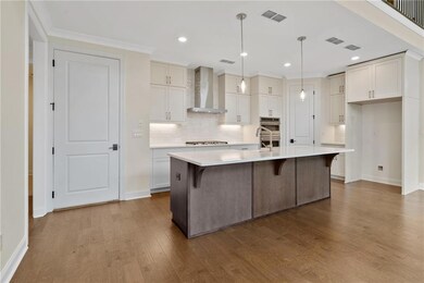 Plenty of cabinets Note: not actual home. Photo of previously built Lawrence plan