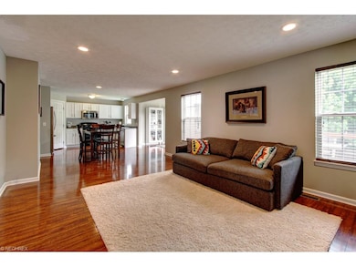 The family room, kitchen, and sun room offer a nic