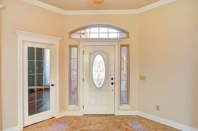 FOYER:  Plus Glass Door to the Study/ 4th Bedroom