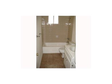 Full bathroom featuring vanity, toilet, shower / 