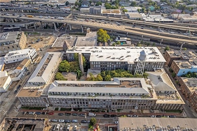 From overboard, the Cotton Mill was historically a manufacturing plant and now is a gorgeous historic building with 287 units, a massive common courtyard, among so many other amenities and historical details.